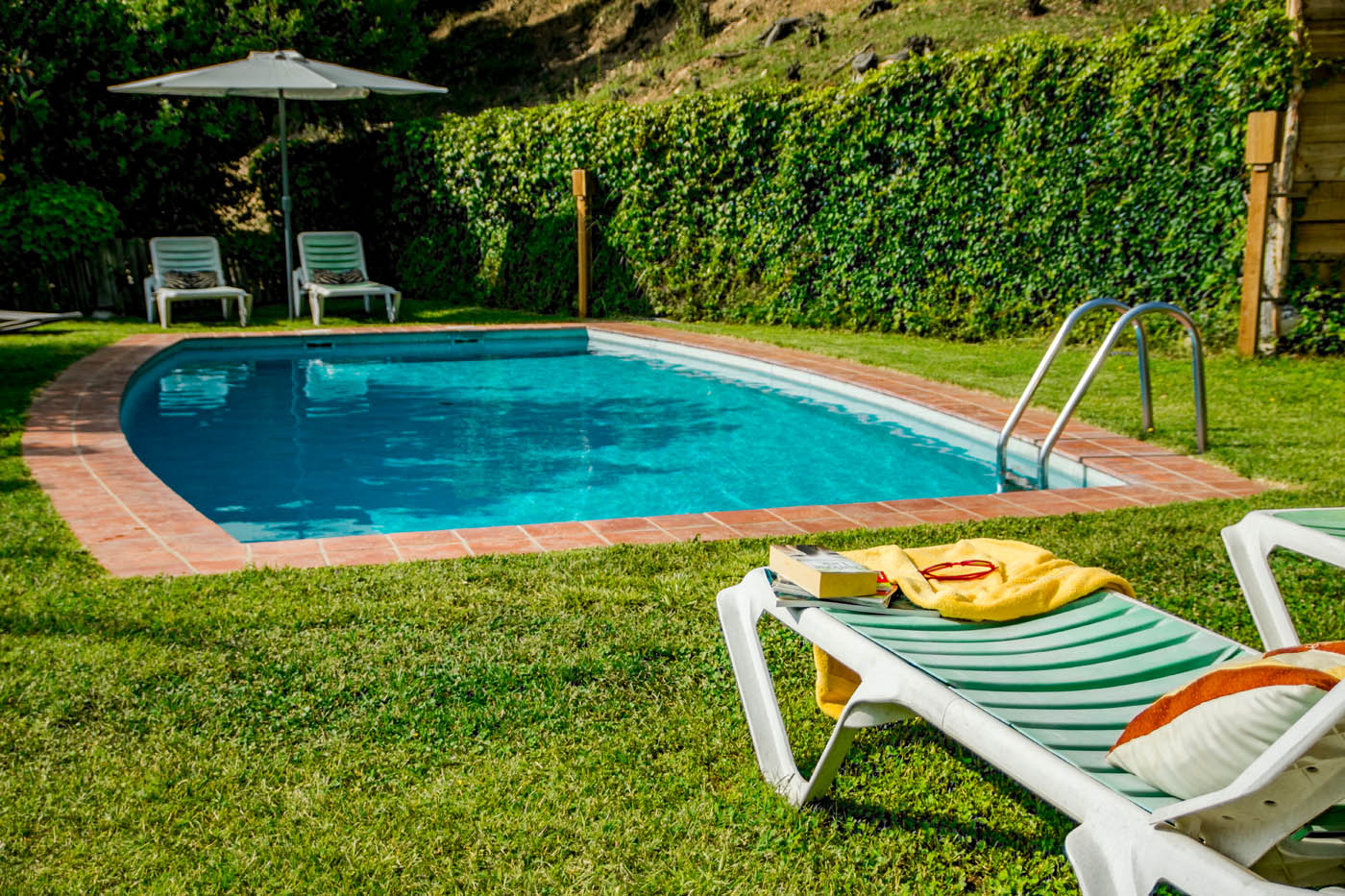 Lawned gardens by pool