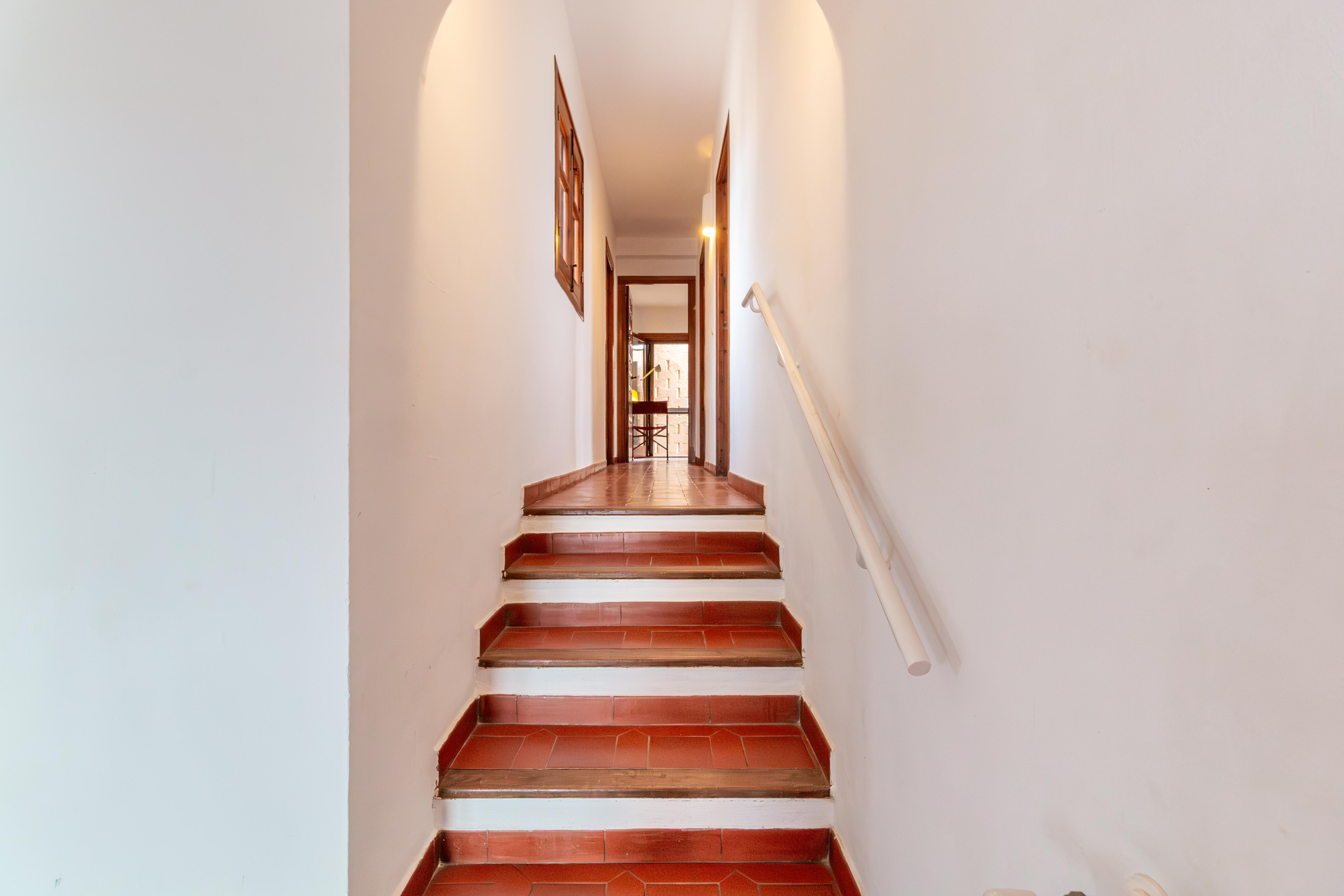 Escaleras a dormitorios