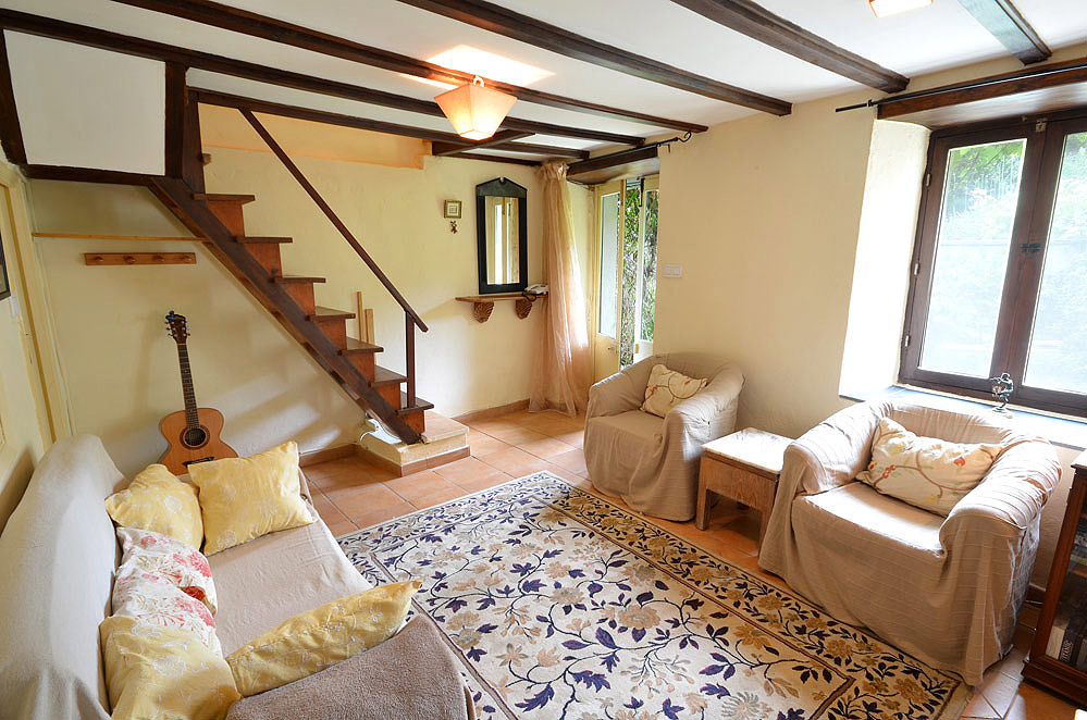 Living area with steps to first floor