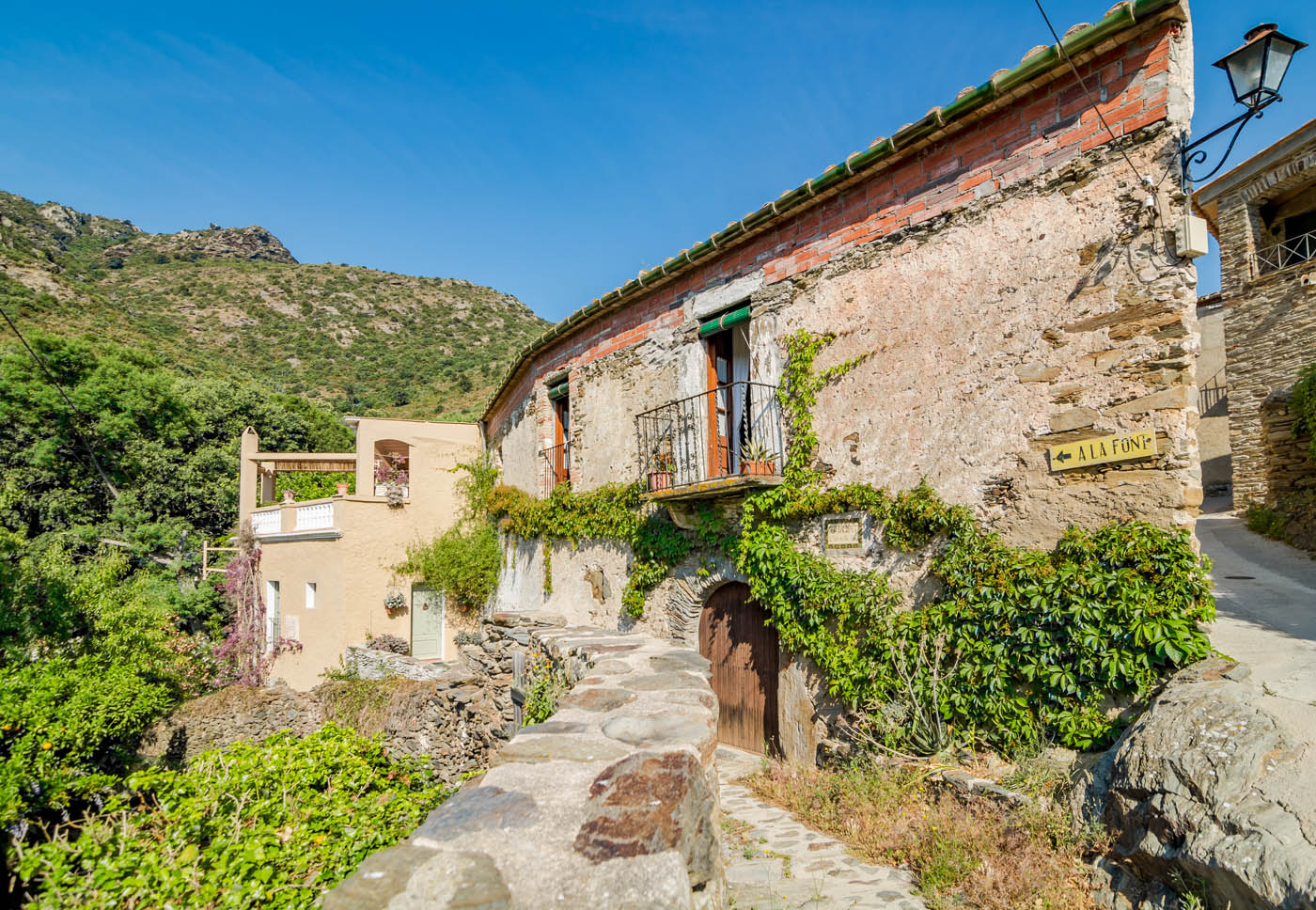 A historical 12th century house with gardens