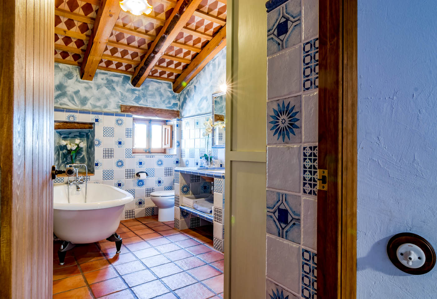 En suite master bedroom; bathroom with bathtub