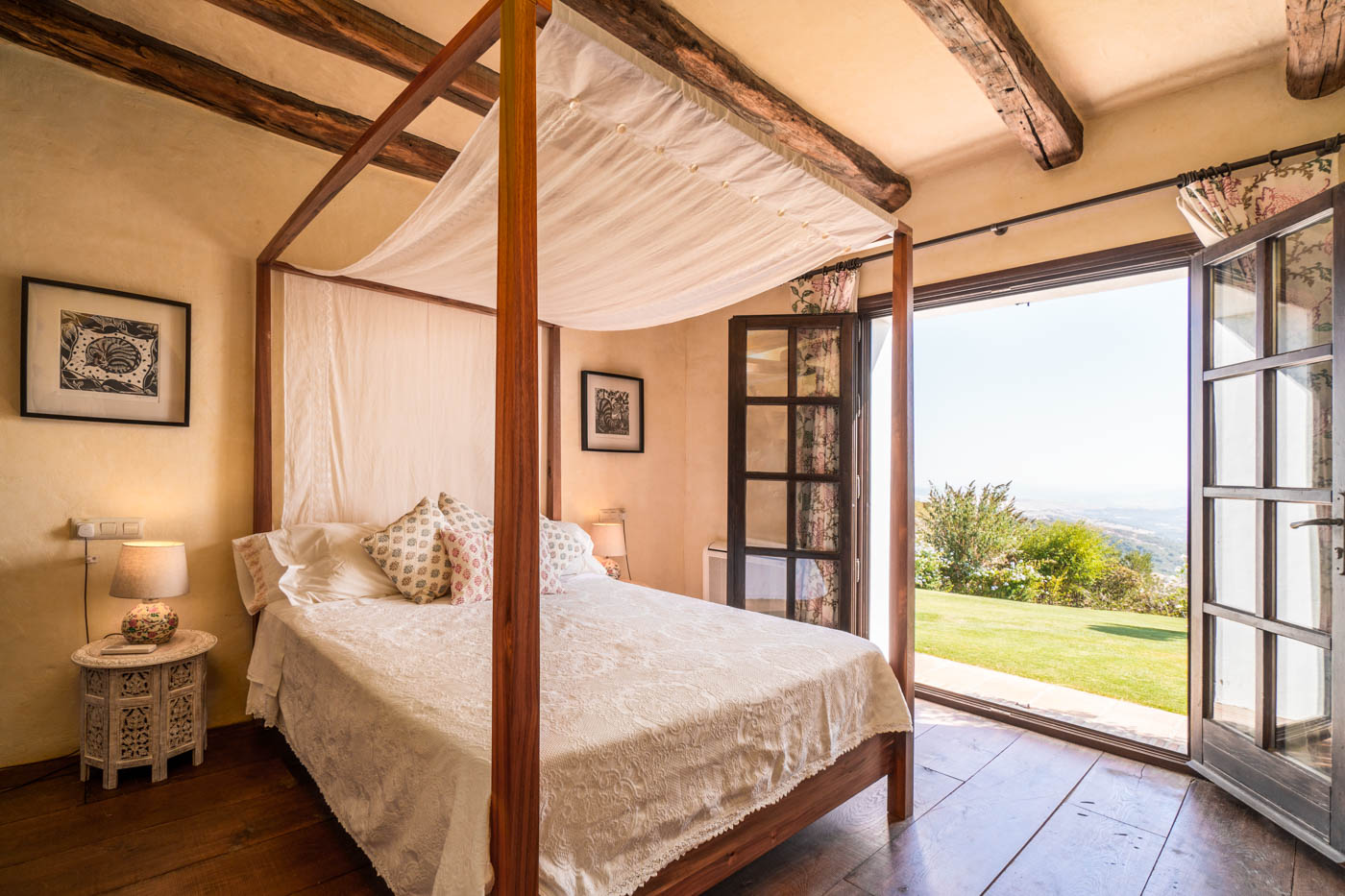 4 poster bedroom also with doors opening to gardens