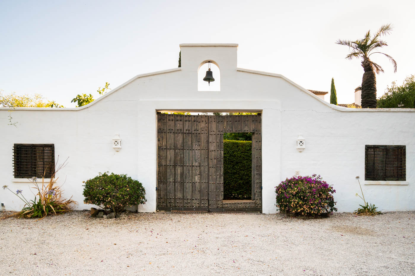 Entrance to villa from uncovered parking area