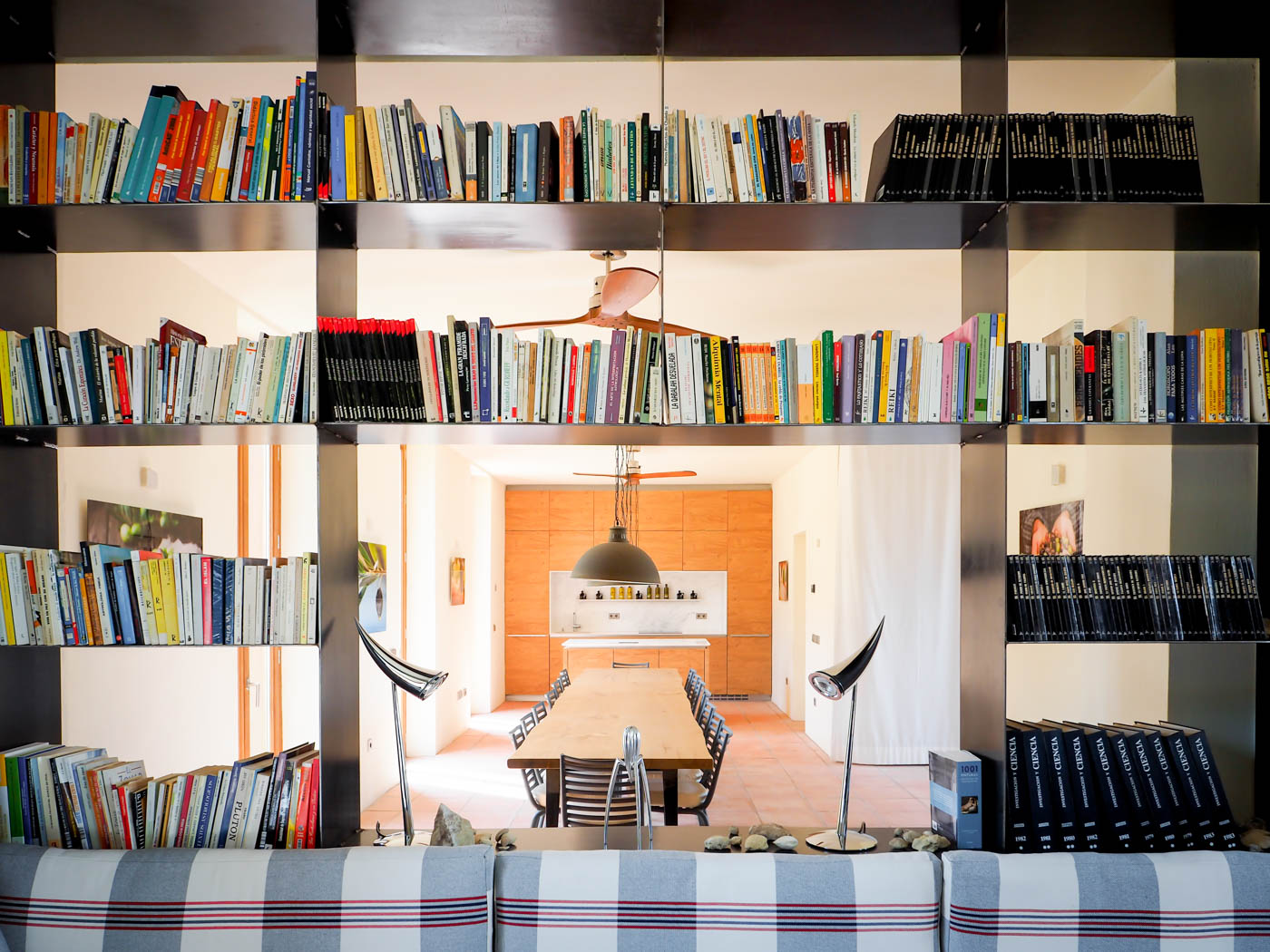 Dining area with kitchen seen from library