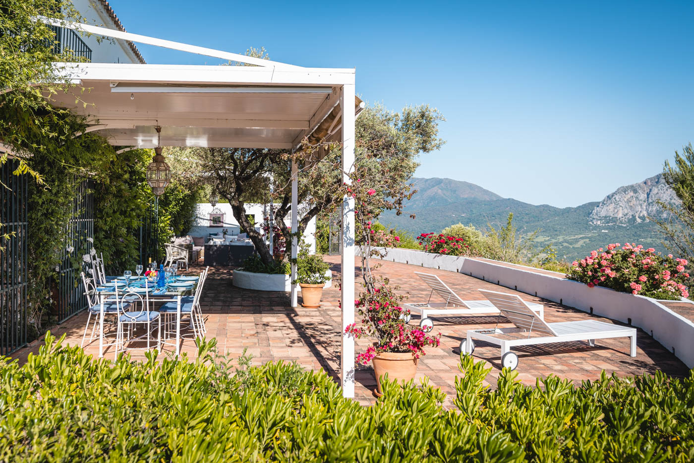 Furnished terrace next to pool area and house