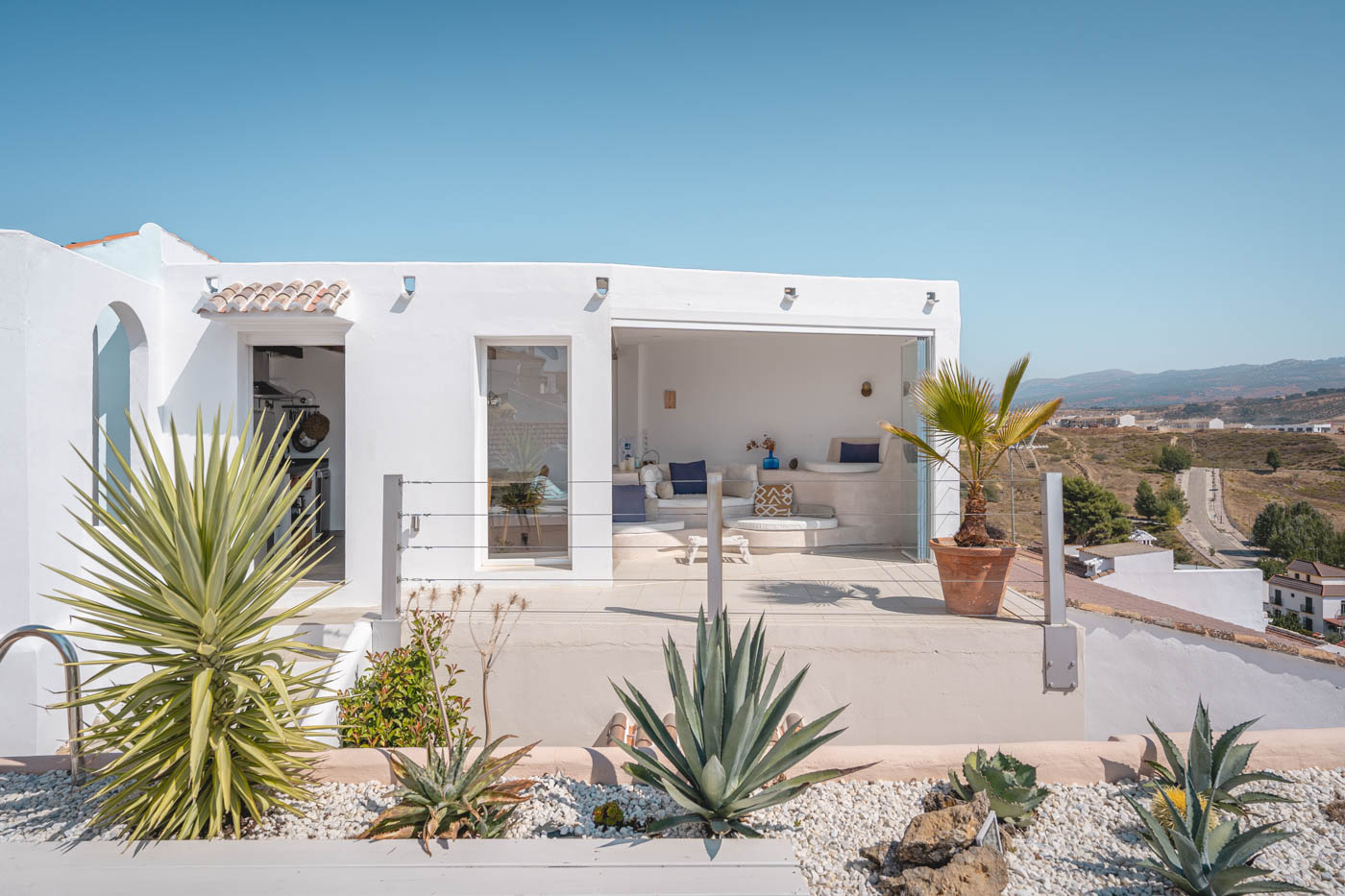 The kitchen / dining / living area seen from solarium
