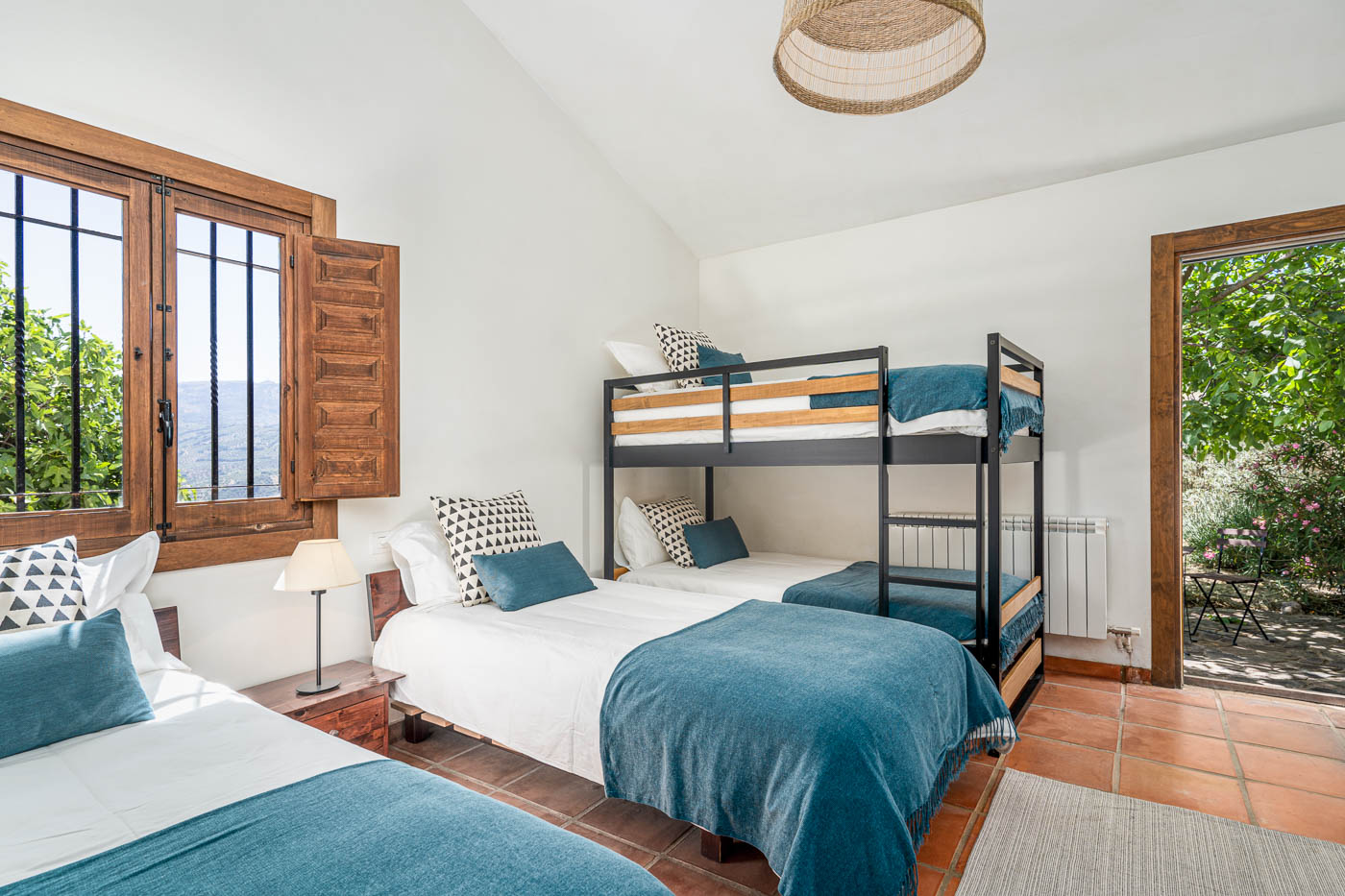 Bedroom with 2 beds and bunk beds too