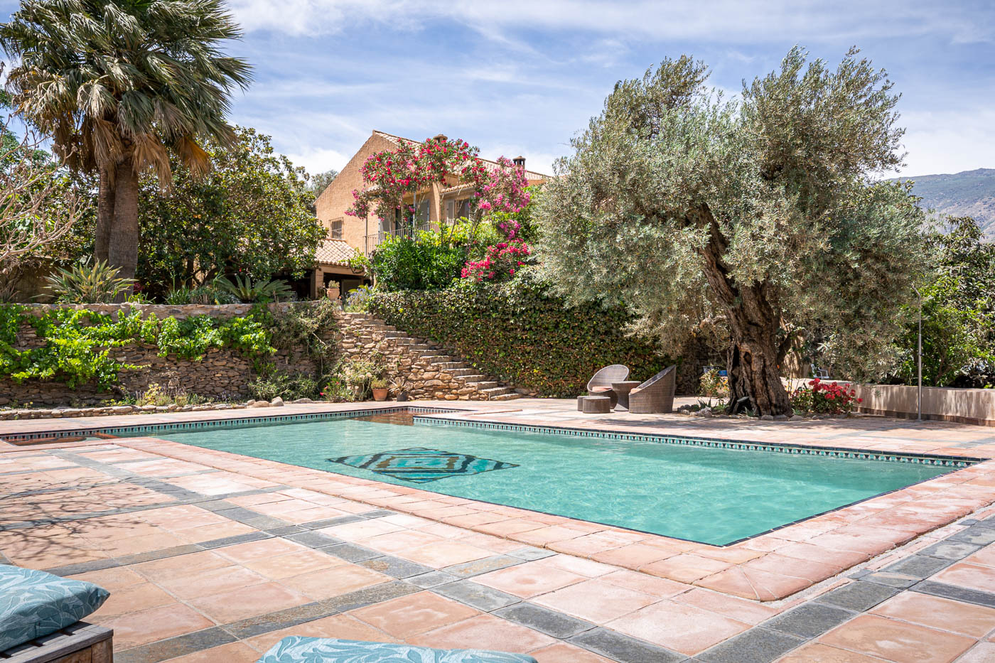 Pool and house with unprotected stairs