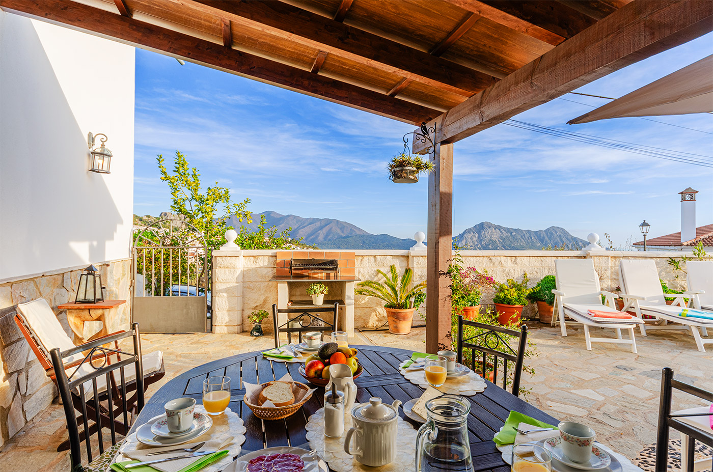 Walled patio with pergola