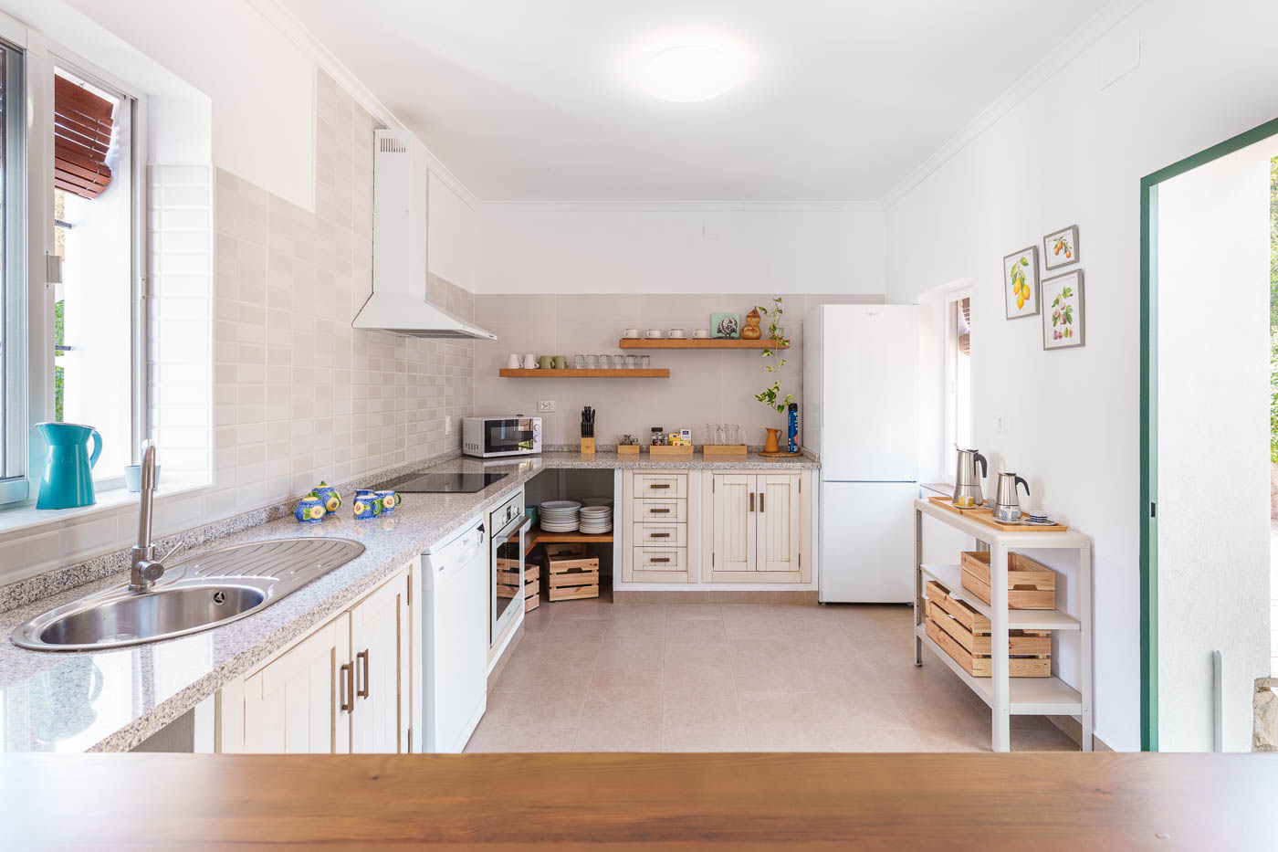 Kitchen with doors to gardens