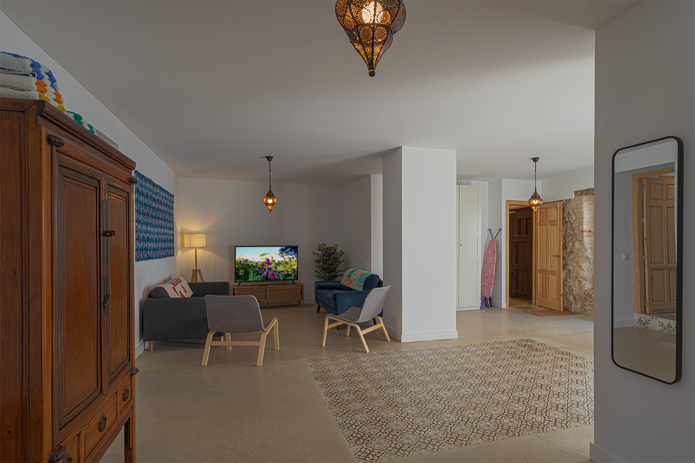 The only TV is on the living space of the mid-level