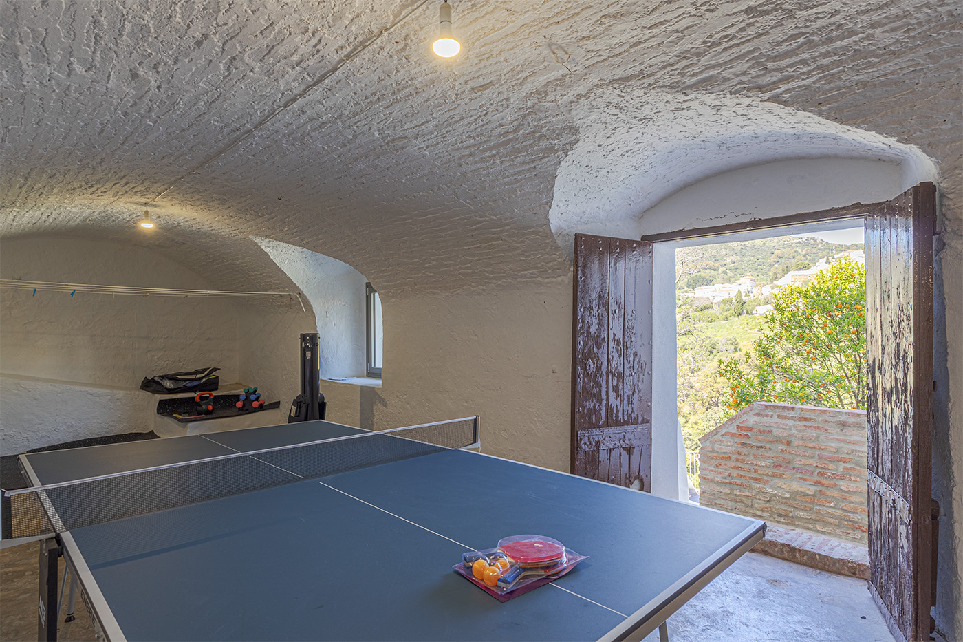 Door to stairs down to pool area and bedroom 8