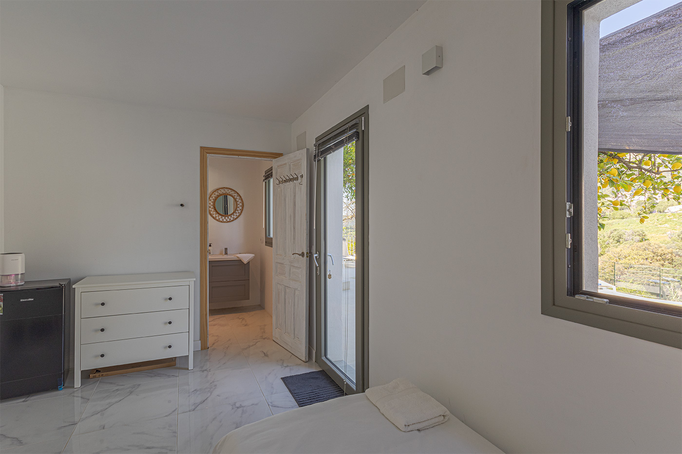 Bedroom, 8 with bathroom and small fridge