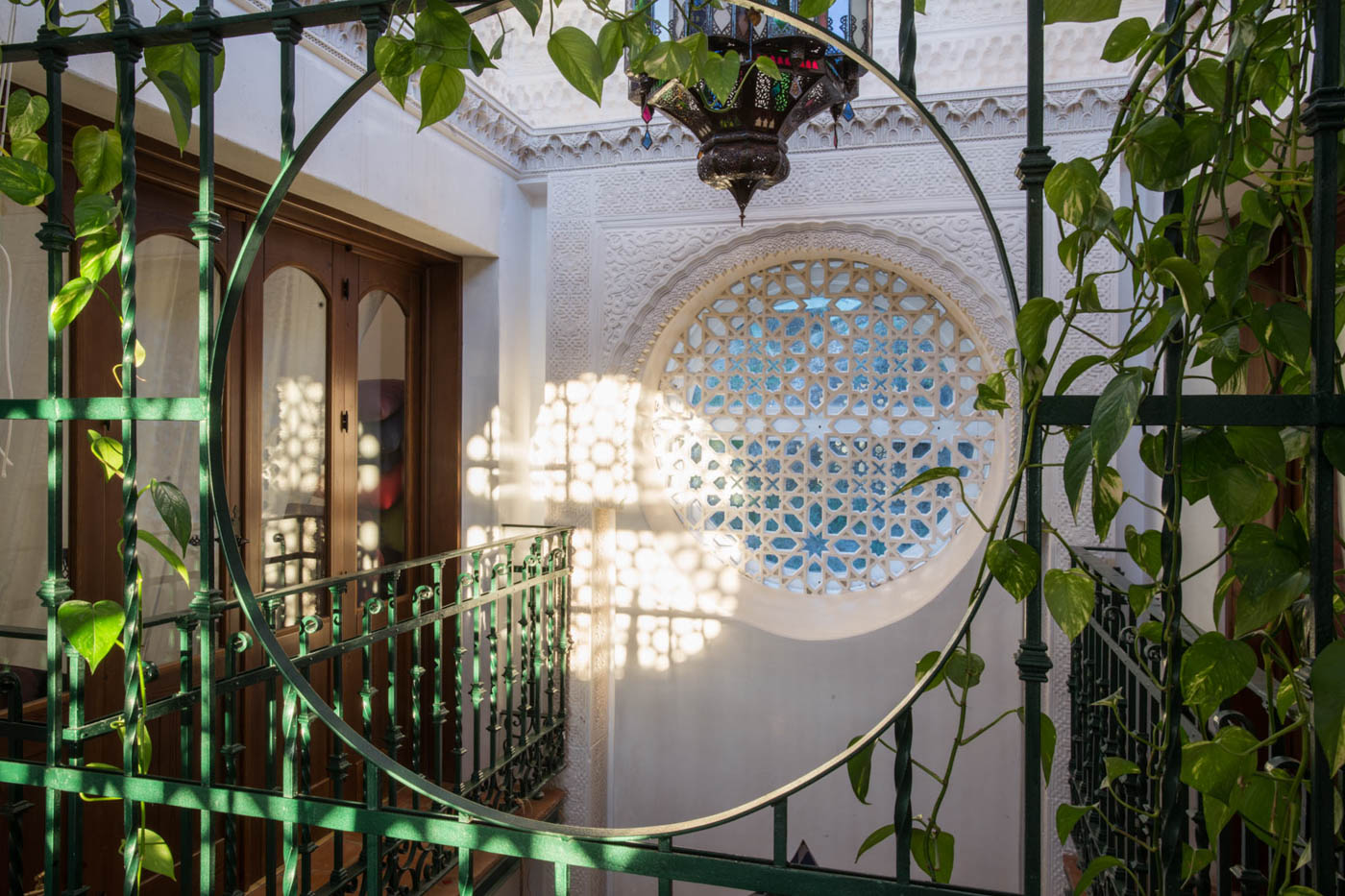Inside, both floors are arranged around central Moroccan patio