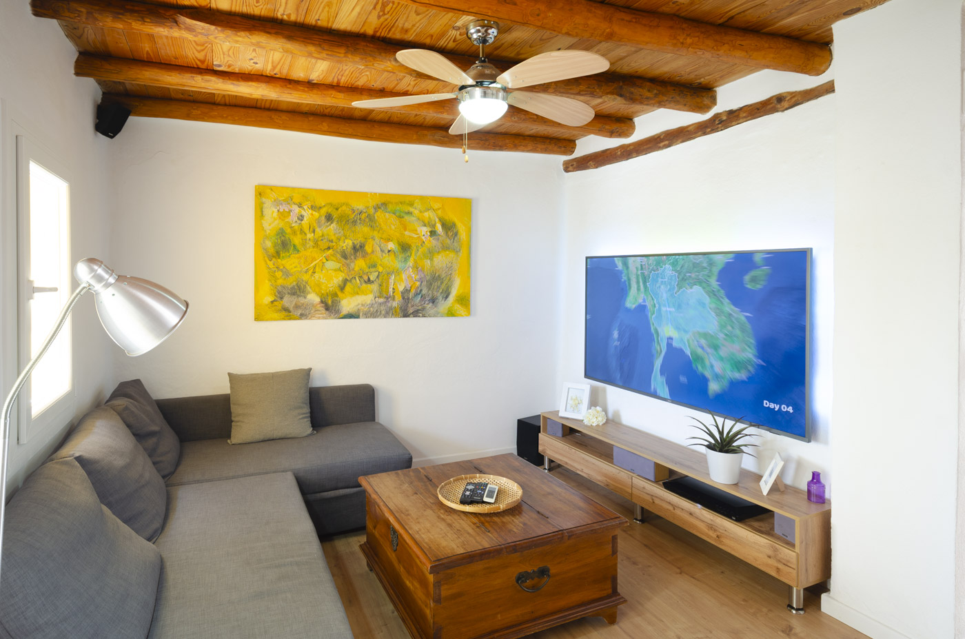 Large Smart TV and comfy sofa