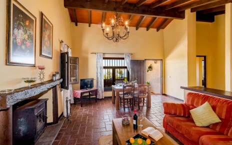 The property has high ceilings and comfy couches