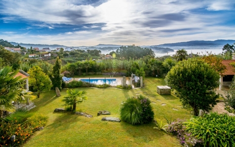 Gardens, pool & estuary in the distance