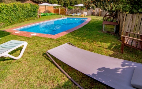 The pool is a short stroll away from the cottages