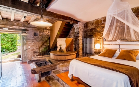 Large bedroom with original mill features