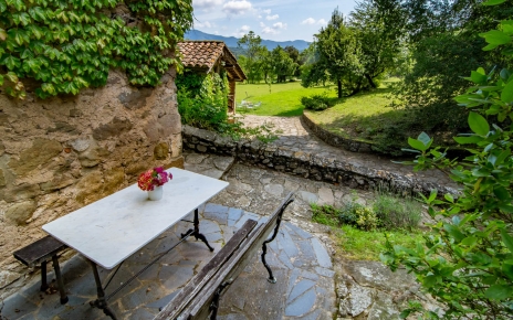 Simple outdoor  furniture by main house