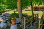 Charming arrival via wooden bridge