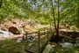 Park your car and cross the bridge to enter your holiday home