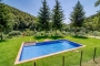 Lawned gardens by pool