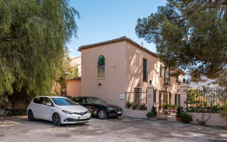 The parking area is directly next to the house
