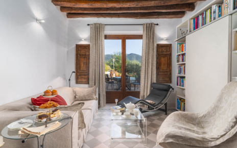 Seating area with doors opening to terrace