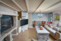Living area with steps to kitchen / dining area