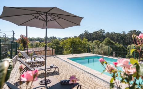 Fenced 8 x 4 metre pool with hills of Portugal as backdrop