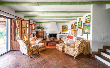 Living room with doors opening to terraces