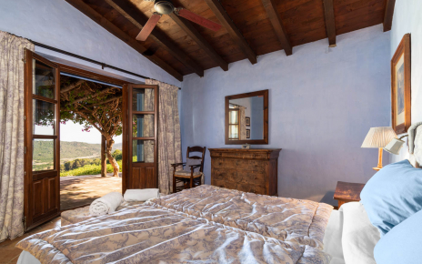 Double bedded room with doors opening to terrace