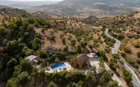The house is located by a country lane down to a lake