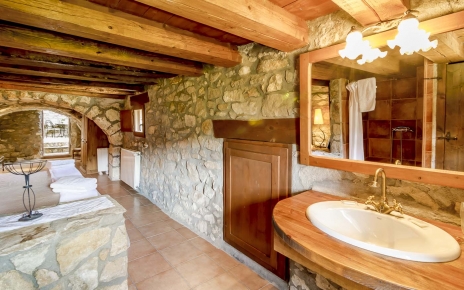 The romantic room has lowish ceilings but it is cosy 