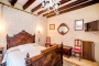 This bedrooms has its own TV