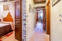 Hallway seen from terrace / patio, kitchen on far end 