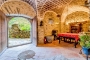 Lower floor with own door to gardens is dated 12th century