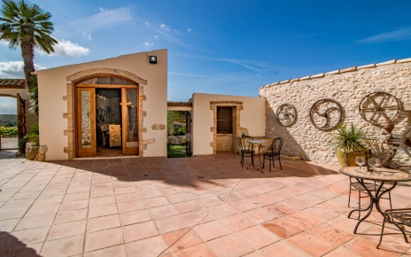 Door to dining area next to outdoor kitchen
