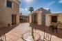 Main patio leads to house, pool, outdoor dining room
