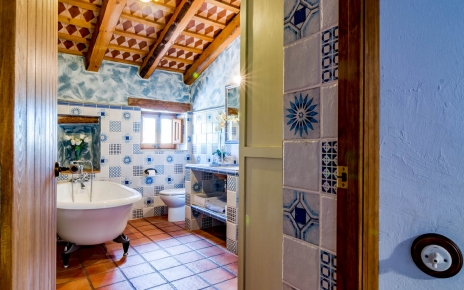 En suite master bedroom; bathroom with bathtub