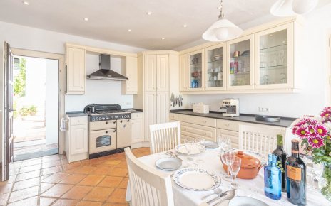 Excellent kitchen with doors to back patio and fron terrace
