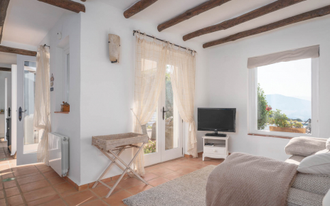 Habitación en planta de arriba con terraza