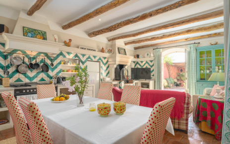 Open plan kitchen / seating area with doors to terrace