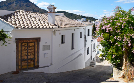 An old door in a village street gives way to this luxury villa