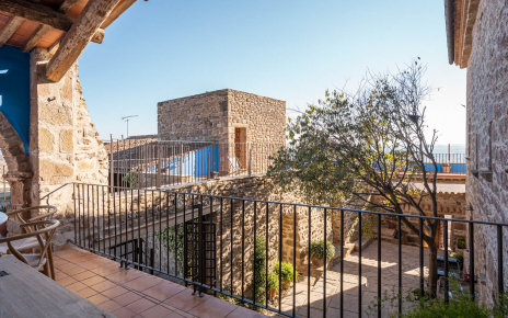 Porch accessed from kitchen with access to terraces