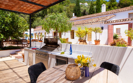 The outdoor kitchen is shaded