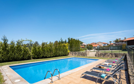 Private gated pool with sunloungers