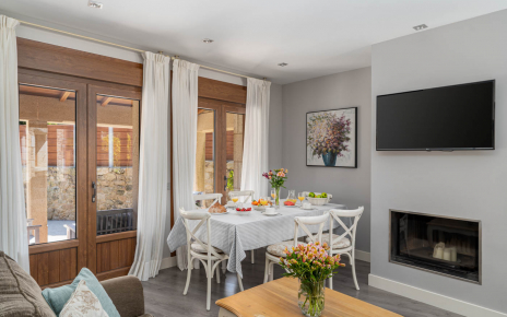 Indoor dining facilities with glass fronted fireplace