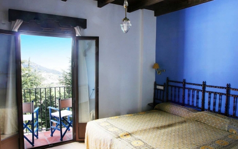 Dormitorio con terraza